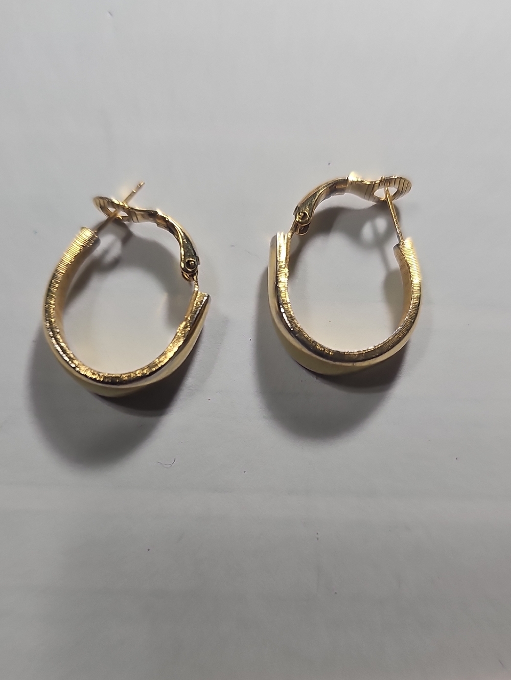 Trifari Gold Curved Hoop Earrings
